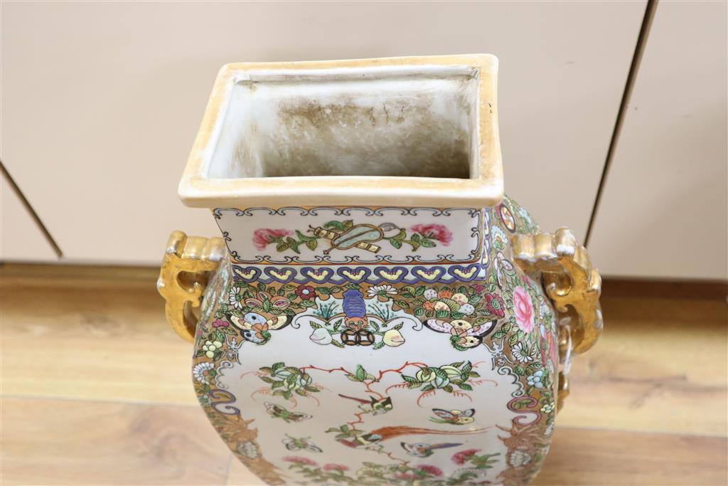 Eliza Simmance -a Doulton reticulated silicon ware vase, a Chinese lidded vase, a Japanese fish decorated vase, 59cm